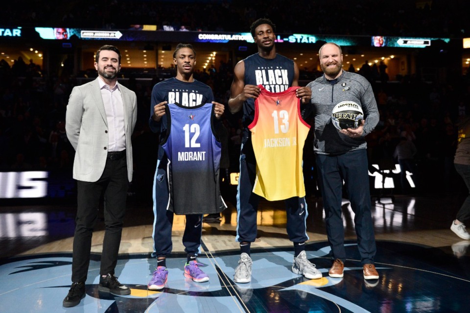 <strong>Memphis Grizzlies guard Ja Morant (12) and forward Jaren Jackson Jr. (13), standing with general manager Zach Kleiman, left, and coach Taylor Jenkins, are recognized for their upcoming appearance in the NBA All-Star, before the team's NBA matchup against the Utah Jazz on Wednesday, Feb. 15, 2023, in Memphis, Tenn.</strong> (AP Photo/Brandon Dill)