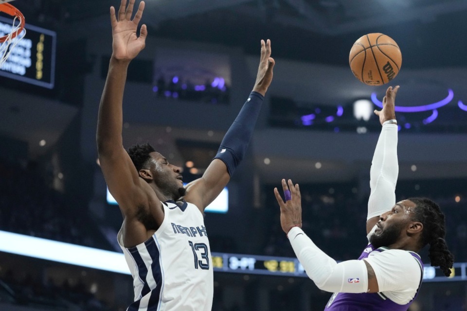 <strong>Memphis Grizzlies' Jaren Jackson Jr. blocks Milwaukee Bucks' Jae Crowder during the first half of an NBA basketball game Friday, April 7, 2023, in Milwaukee.</strong> (AP Photo/Morry Gash)