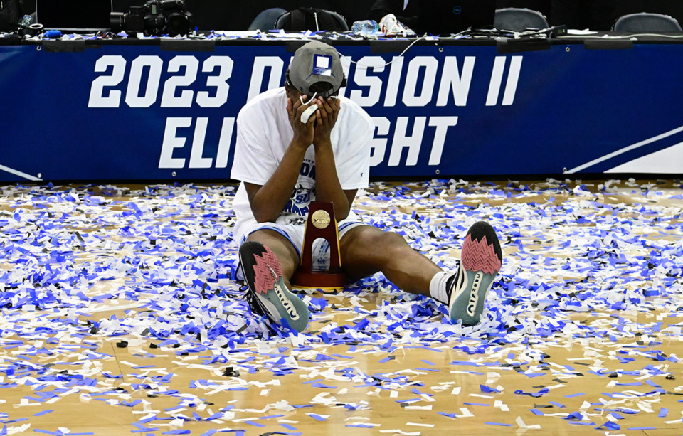 <strong>Jonathan Pierre celebrates after winning the 2023 NCAA Division-II basketball title.</strong> (Courtesy Photoyou4life Photography)