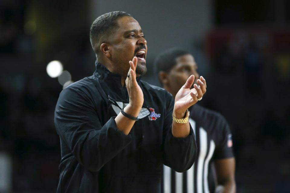 <strong>Then-Tulsa head coach Frank Haith shouts instructions to his team during the first half of an NCAA college basketball game against Houston in Tulsa.</strong> on Saturday, Jan. 15, 2022. (AP Photo/Dave Crenshaw)