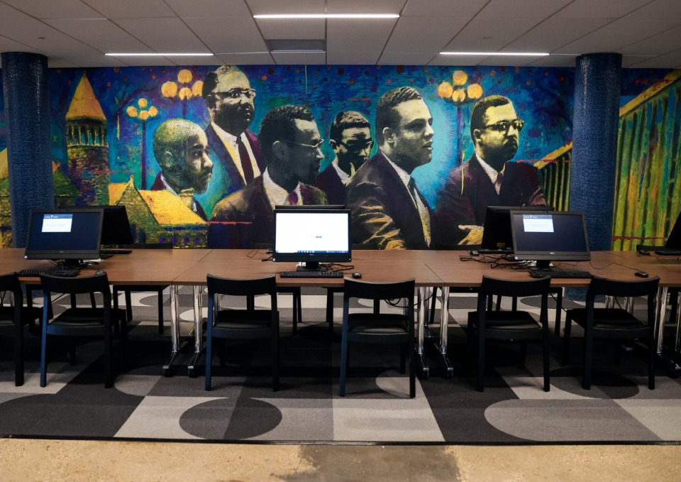 <strong>This large mural at the renovated Cossitt Library shows the civil rights attorneys who represented students arrested in 1960 for library sit-ins.</strong> (Mark Weber/The Daily Memphian)