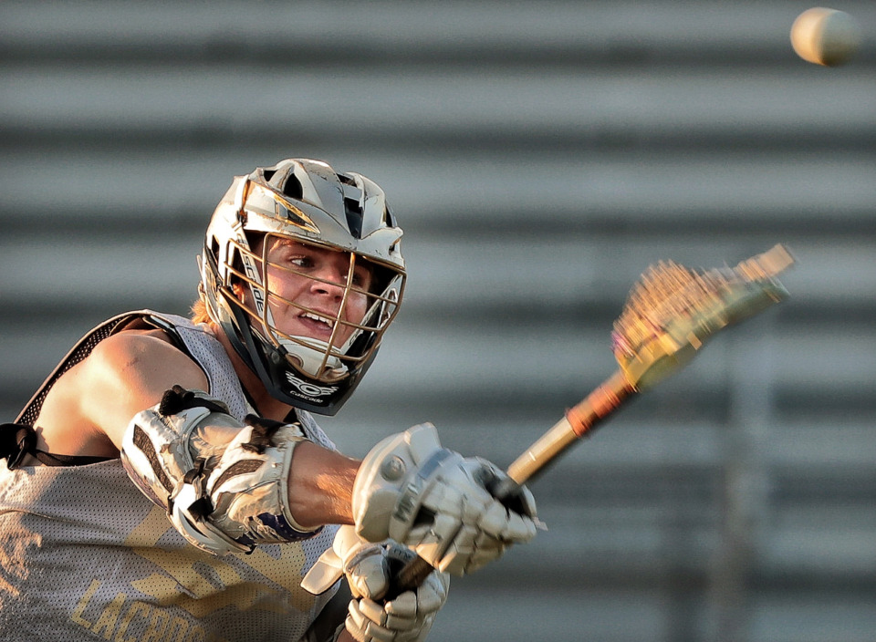 <strong>Christian Brothers face-off player Will Johns makes a pass during practice at CBHS on May 16, 2019. Johns&nbsp;has won over 76% of his face-offs heading into Saturday's Division 1 final against Montgomery Bell Academy.</strong> (Jim Weber/Daily Memphian)