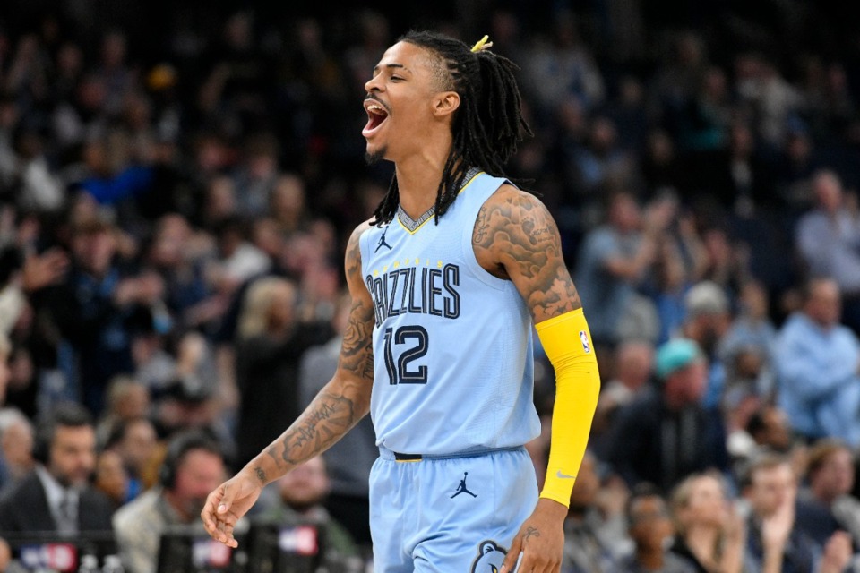 <strong>Memphis Grizzlies guard Ja Morant reacts in the first half of an NBA basketball game against the Phoenix Suns, Monday, Jan. 16, 2023, in Memphis, Tenn.</strong> (AP Photo/Brandon Dill)