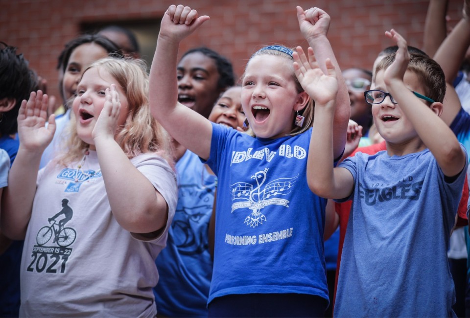 <strong>The children of Idlewild Elementary react to the grand opening of a new greenspace on their Midtown campus April 14, 2023.</strong> (Patrick Lantrip/The Daily Memphian)