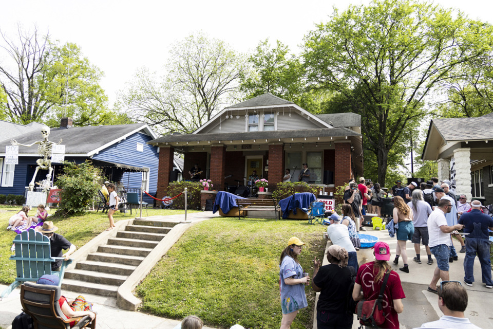<strong>A crowd gathered to watch and listen to the Memphis Winslows perform during the Cooper-Young Community Association&rsquo;s Cooper-Young Porchfest Saturday, April 15. Staged on the porches of throughout the historic neighborhood, the event featured bands playing on front porches to welcome spring and celebrate Cooper-Young.</strong> (Brad Vest/Special to The Daily Memphian)