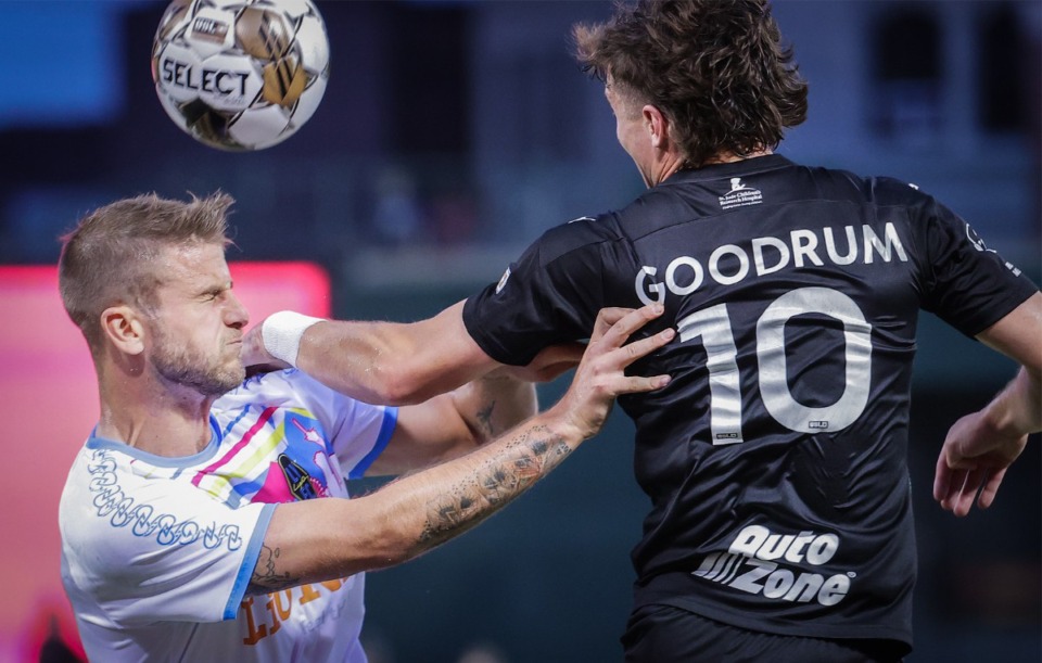 <strong>Memphis 901 FC forward Phillip Goodrum (10) goes up for a header over former teammate and Las Vegas Lights FC defender Zach Carroll (3) during an April 15, 2023 match.</strong> (Patrick Lantrip/The Daily Memphian)