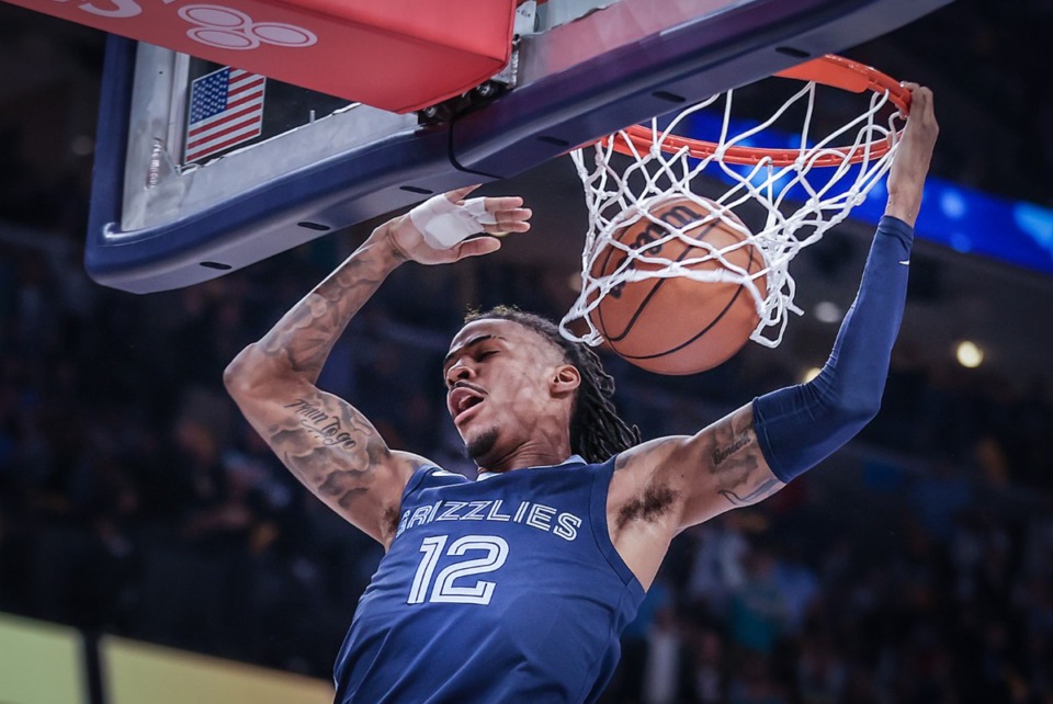<strong>Memphis Grizzlies guard Ja Morant (12) was injured during the 4th quarter. He dunks the ball during an April 16, 2023 playoff game against the Los Angeles Lakers.</strong> (Patrick Lantrip/The Daily Memphian)