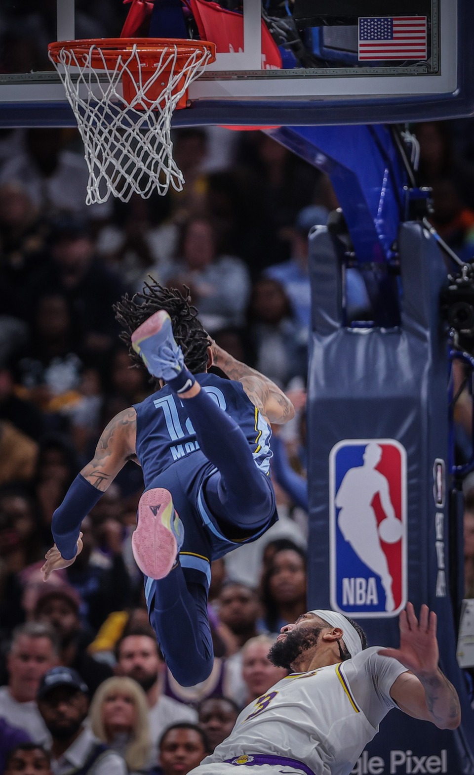 <strong>Memphis Grizzlies guard Ja Morant (12) hurts his hand after a hard fall during an April 16, 2023 playoff game against the Los Angeles Lakers.</strong> (Patrick Lantrip/The Daily Memphian)
