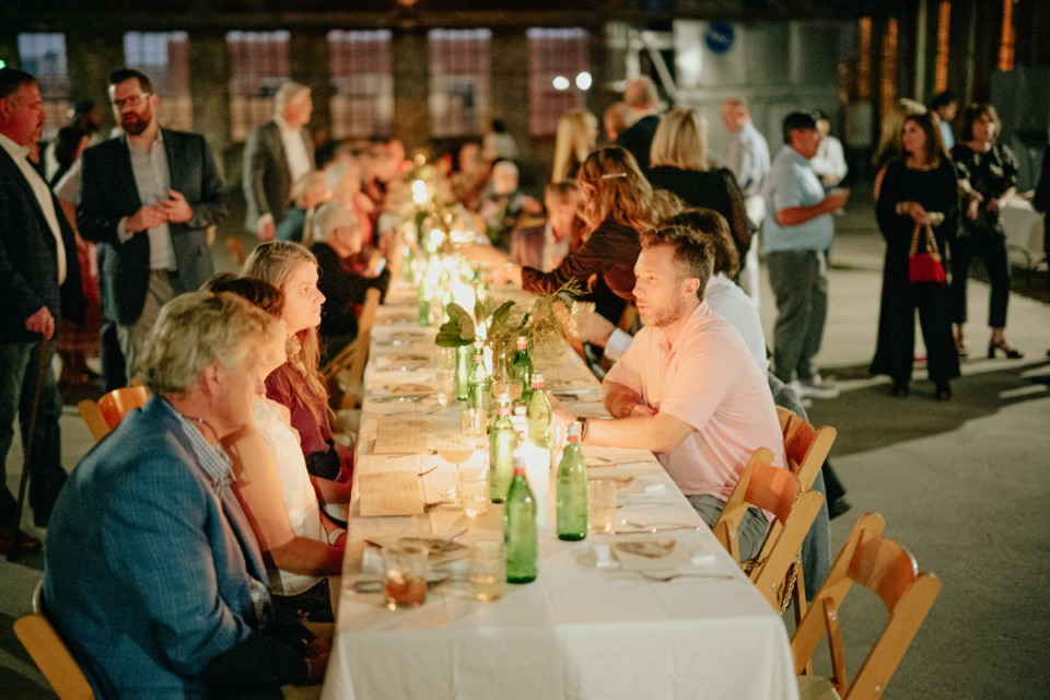 <strong>Diners are seated in a long table during the October 2022 Etowah dinner.</strong> (Courtesy Etowah/photo by Robert Jordan Finney Photograph)&nbsp;&nbsp;