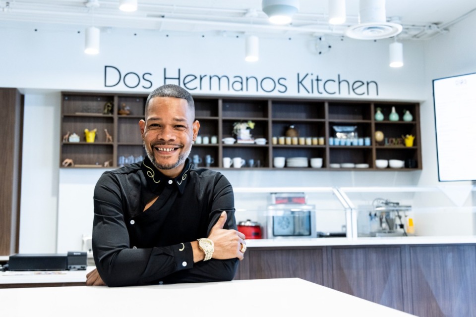 <strong>Eli Townsend, chef at the Dos Hermanos Kitchen, poses inside the newly reopened Cossitt Library.</strong> (Brad Vest/Special to The Daily Memphian)