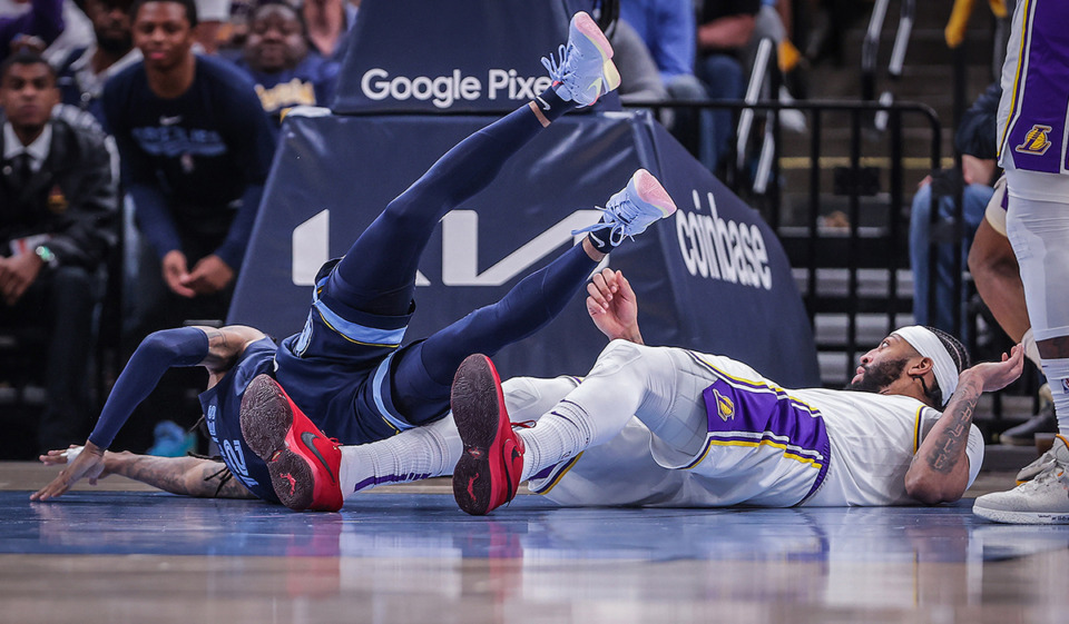 <strong>Memphis Grizzlies guard Ja Morant (12) hurts his hand during an April 16 playoff game against the Los Angeles Lakers.</strong> (Patrick Lantrip/The Daily Memphian)