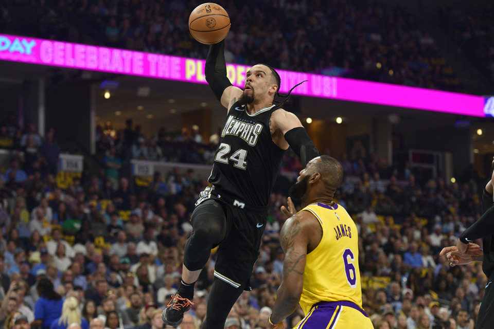 <strong>Memphis Grizzlies forward Dillon Brooks (24) goes up for a dunk against Los Angeles Lakers forward LeBron James (6) during the first half of Game 2 of a first-round NBA basketball playoff series Wednesday, April 19, 2023, in Memphis.</strong> (Brandon Dill/AP Photo)