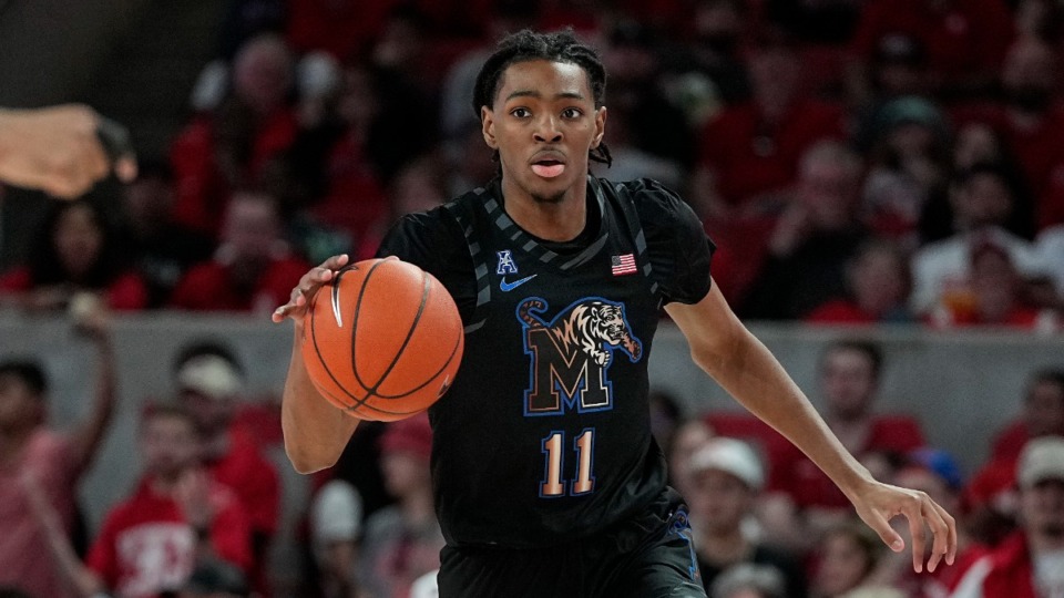 <strong>Memphis guard Johnathan Lawson (11) brings up the ball during the first half of an NCAA college basketball game against Houston, Sunday, Feb. 19, 2023, in Houston.</strong> (AP Photo/Kevin M. Cox)