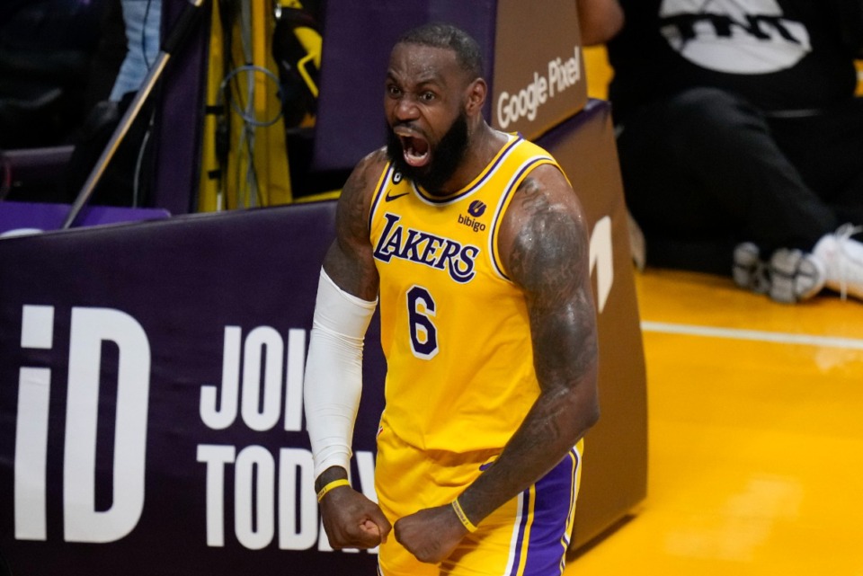 <strong>Los Angeles Lakers' LeBron James (6) reacts after making a basket against the Memphis Grizzlies in overtime on April 24, 2023, in Los Angeles.</strong> <strong>The Lakers won 117-111.</strong> (Jae C. Hong/AP)