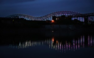 <strong>The Mighty Lights were lit up blue, green and purple after sunset Tuesday to commemorate National Crime Victims&rsquo; Rights Week.</strong> (Patrick Lantrip/The Daily Memphian)