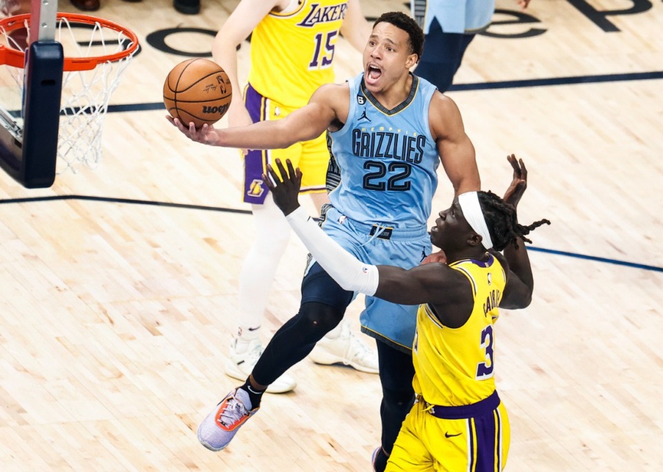 <strong>Memphis Grizzlies guard Desmond Bane (left) drives for a layup against Los Angles Lakers defender Wenyen Gabriel (right) on Wednesday, April 26, 2023.</strong> (Mark Weber/The Daily Memphian)
