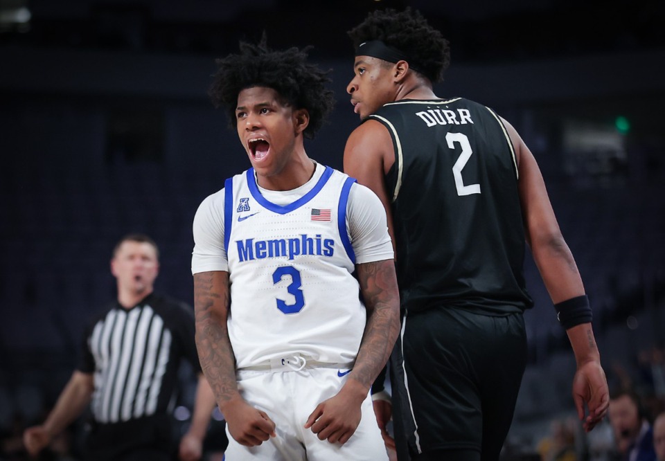 <strong>Kendric Davis (3) celebrates a three during a March 10, 2023 Memphis game against UCF. Davis was&nbsp;The guard was named CBS Sports&rsquo; Transfer Player of the Year on Thursday.&nbsp;</strong>(Patrick Lantrip/Daily Memphian file)