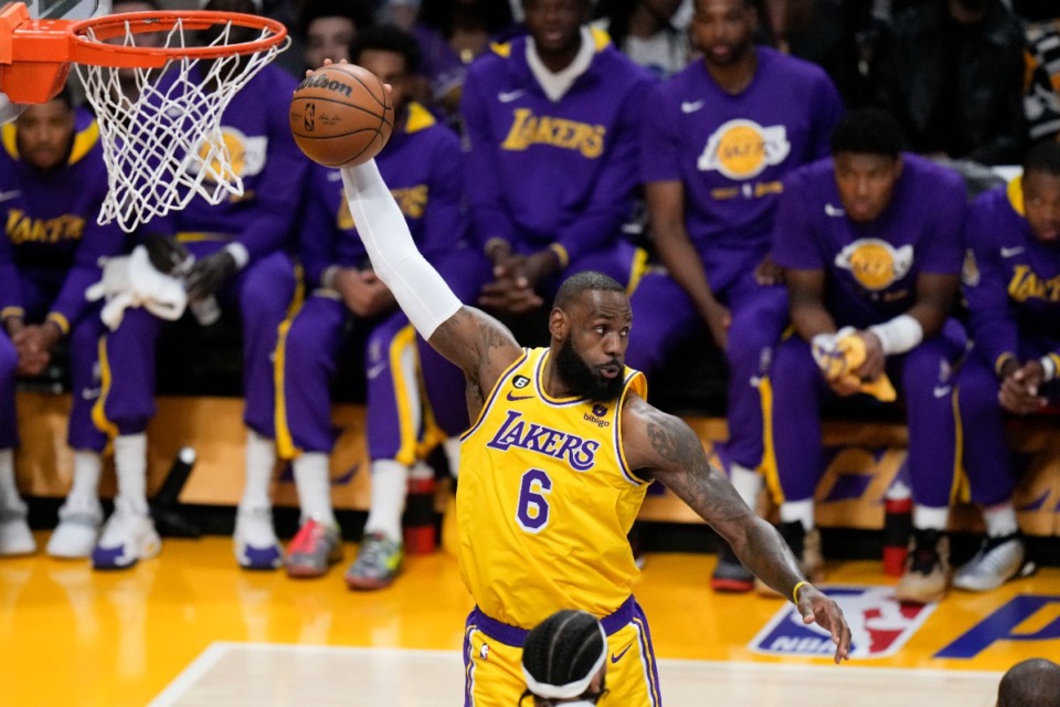 <strong>Los Angeles Lakers' LeBron James grabs a rebound during the first half of Game 6 of the team's first-round NBA basketball playoff series against the Memphis Grizzlies on Friday, April 28, 2023, in Los Angeles.</strong> (Jae C. Hong/AP)