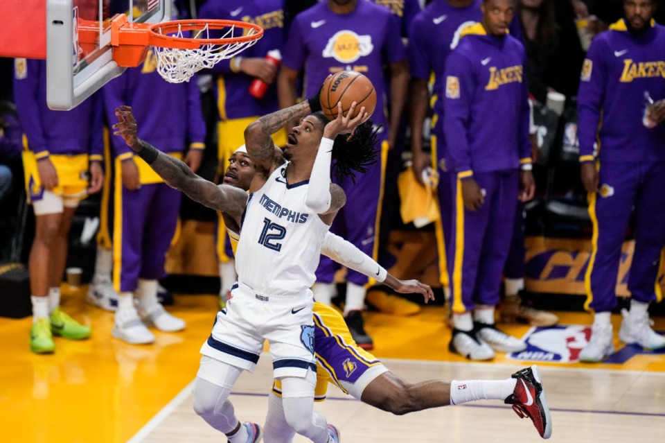 <strong>Memphis Grizzlies' Ja Morant (12) drives to the basket against Los Angeles Lakers' Jarred Vanderbilt on April 28, 2023, in Los Angeles.</strong> (Jae C. Hong/AP)