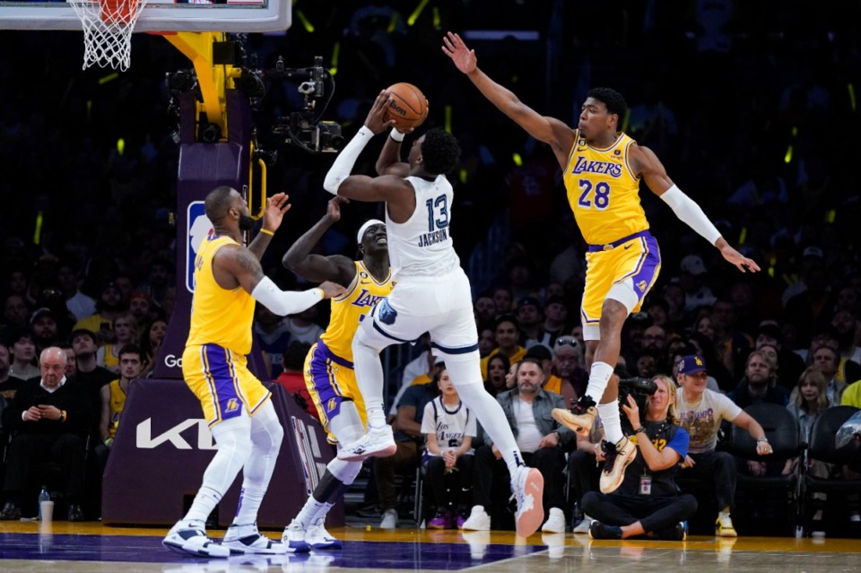 <strong>Los Angeles Lakers' Rui Hachimura (28) leaps to block a shot by Memphis Grizzlies' Jaren Jackson Jr. (13) on Friday, April 28, 2023, in Los Angeles.</strong> (Jae C. Hong/AP)