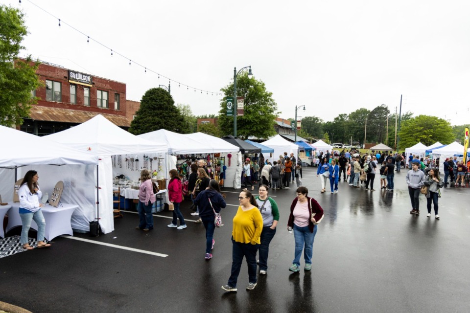 <strong>A light rain doesn&rsquo;t deter shoppers visiting vendors&rsquo; tents at Depot Square during the Arlington in April festival, Saturday, April 29, 2023.</strong> (Brad Vest /Special to The Daily Memphian)