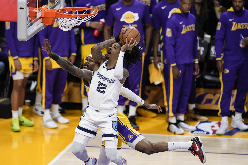 <strong>The Memphis Grizzlies' Ja Morant (12) drives to the basket against the Los Angeles Lakers' Jarred Vanderbilt during the first half in Game 6 of a first-round NBA basketball playoff series April 28 in Los Angeles.</strong> (Jae C. Hong/AP file)