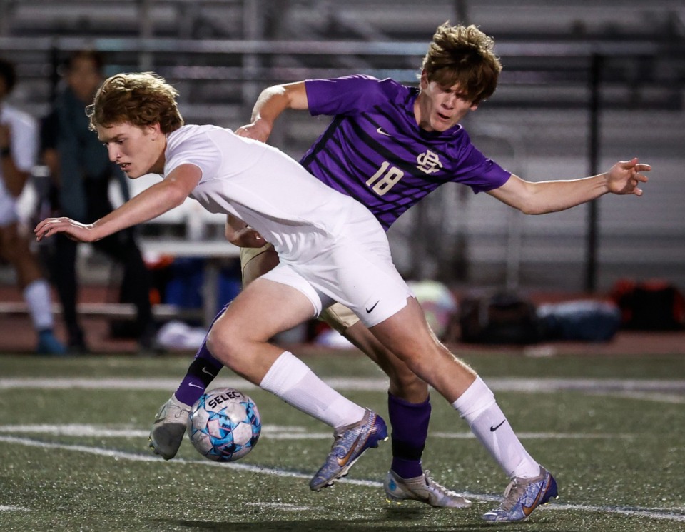 <strong>MUS midfielder William Mallory battles CBHS midfielder Zachary Parris (back) on Tuesday, May 2, 2023.</strong> (Mark Weber/The Daily Memphian)