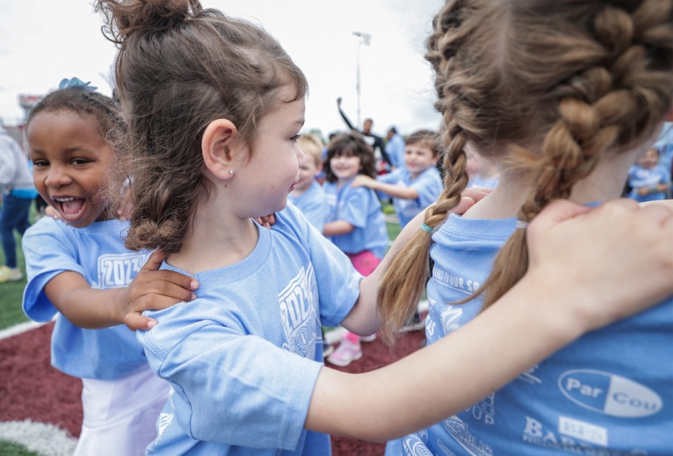 <strong>Children from Collierville Elementary form a conga line at Dragon Games, Collierville School's field day for special needs children May 5, 2023.</strong> (Patrick Lantrip/The Daily Memphian)