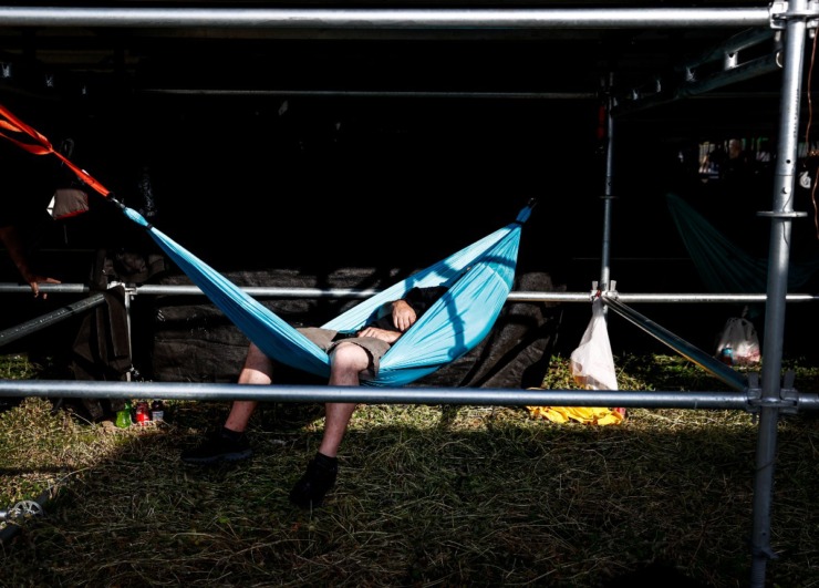 <strong>A stage hand takes a nap before the first day of the Beale Street Music Festival Friday.</strong> (Mark Weber/The Daily Memphian)