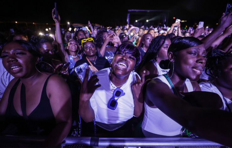 <strong>Fans sing along to GloRilla at the Beale Street Music Festival at Tom Lee Park, Saturday May 6, 2023.</strong> (Patrick Lantrip/The Daily Memphian)