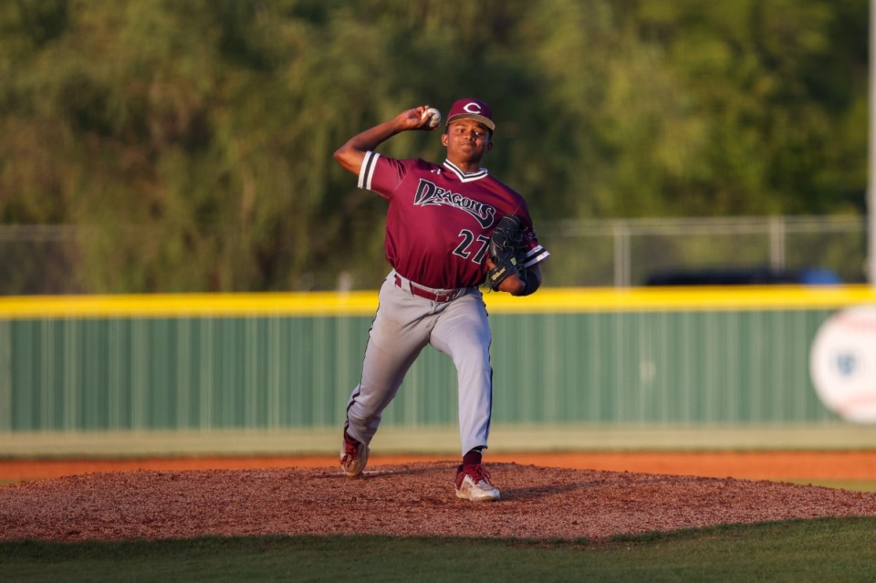 <strong>Ari Bethea (27) pitches for the Dragons in the first inning against the Arlington Tigers on April 18, 2023.</strong> (Ryan Beatty/Special to the Daily Memphian)