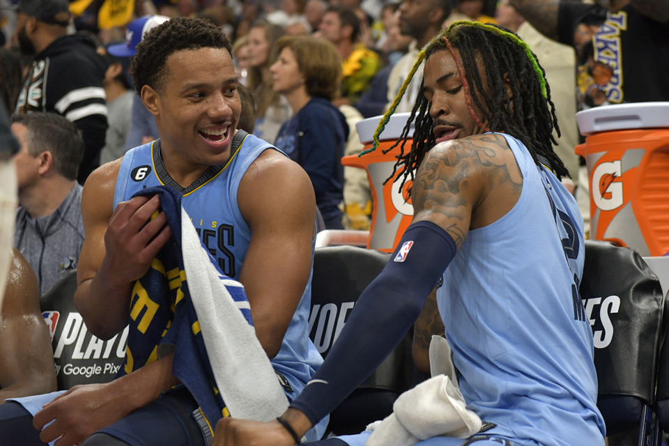 <strong>Memphis Grizzlies guards Desmond Bane, left, and Ja Morant joke on the bench during the second half of Game 5 in a first-round NBA basketball playoff series against the Los Angeles Lakers April 26 in Memphis.</strong> (Brandon Dill/AP file)