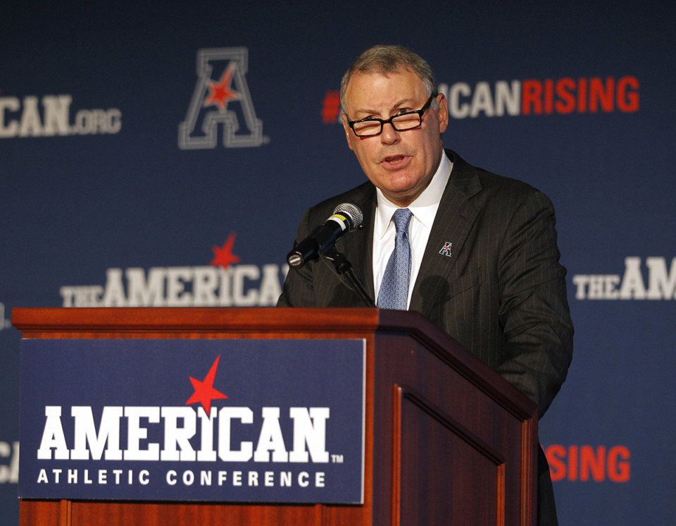 <strong>American Athletic Conference Commissioner Mike Aresco addresses the media in Newport, R.I. in 2015.</strong> (Stew Milne/AP file)
