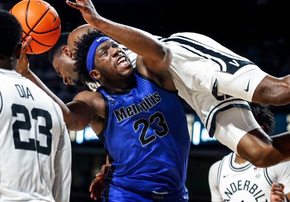 <strong>Memphis center Malcolm Dandridge (middle) is fouled during action against Vanderbilt on Monday, November 7, 2022.&nbsp;The Tigers&rsquo; 6-foot-9 senior forward entered the NCAA transfer portal Wednesday, May 10, per multiple reports.&nbsp;</strong> (Mark Weber/The Daily Memphian file)