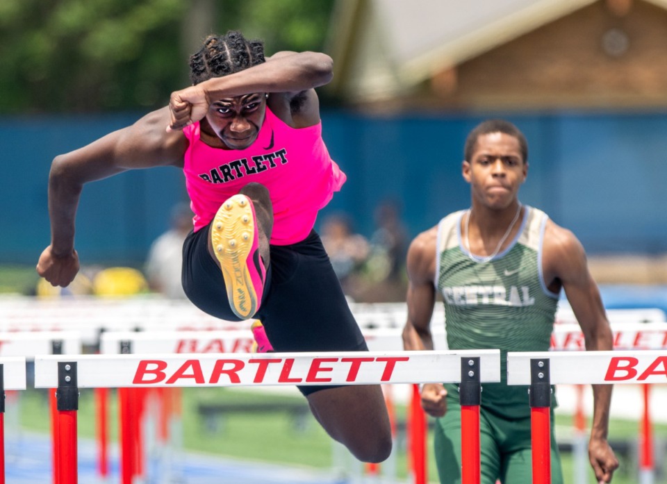 <strong>Rahmaan Rinkin of Bartlett High School pulls away to win the boys 110-meter hurdles at the TSSAA Section 4-AAA track championships Saturday, May 13, 2023, at Bartlett High School.</strong> (Greg Campbell/Special to The Daily Memphian)