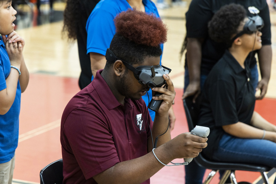 <strong>Terrion Evans, a junior at East High School, focuses during a drone racing competition at Middle College High.</strong> (Brad Vest/Special to The Daily Memphian)