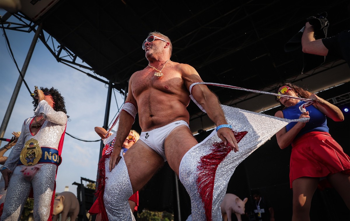 <strong>The Swinos close their set at the Ms. Piggie Idol competition with thematically incorrect but crowd-pleasing beefcake.</strong> (Patrick Lantrip/The Daily Memphian)