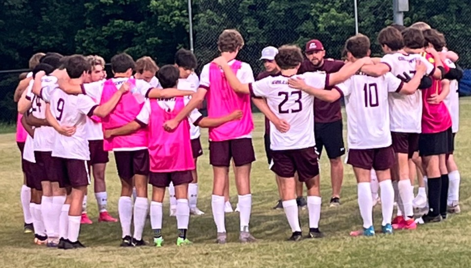 <strong>Collierville huddles during the game with host Bartlett May 18. The Dragons beat the Panthers to claim the region championship for the second straight year.</strong> (John Varlas/The Daily Memphian)