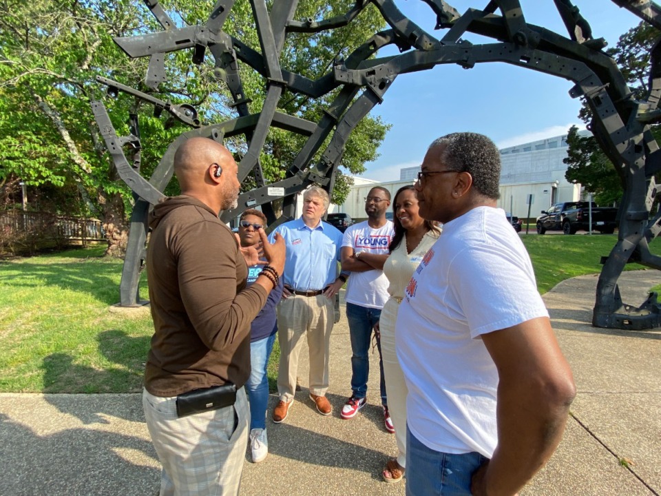 <strong>People&rsquo;s Convention co-founder Rev. Earle Fisher, left, goes over the ground rules for campaigning at the Overton Park Shell May 20 with the five mayoral contenders who showed up in the latest meet-and-greet event.</strong> (Bill Dries/The Daily Memphian)