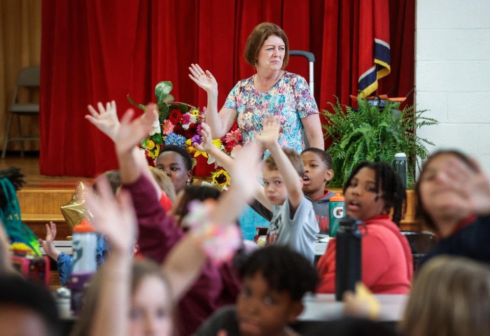 <strong>Sharon McNary is greeted by fourth graders on Monday, May 22, 2023. McNary, a public educator for more than 40 years, is retiring this spring.</strong> (Mark Weber/The Daily Memphian)