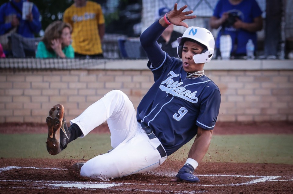 <strong>Northpoint's Isiah Nolan (9) slides into home during a state tournament game against Christian Academy of Knoxville in Murfreesboro, Tennessee, May 23. Northpoint won, 12-3.</strong> (Patrick Lantrip/The Daily Memphian)