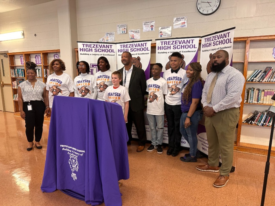 <strong>MSCS school board member Stephanie Love (second from left) and Trezevant Principal Corey Kelly (middle) stand with MSCS students to ask support for a new Frayser high school.</strong> (Alicia Davidson)