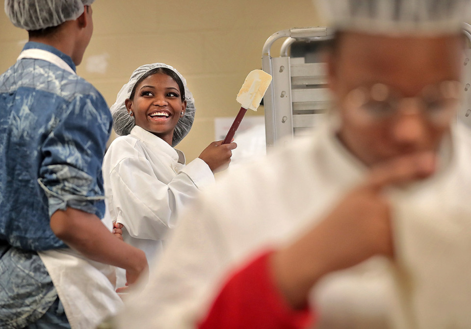 <strong>Culinary arts students Joshua Ivory (left) and Katrice Jones bake cookies during class at the Trezevant Career and Technology Center.</strong> (The Daily Memphian file)