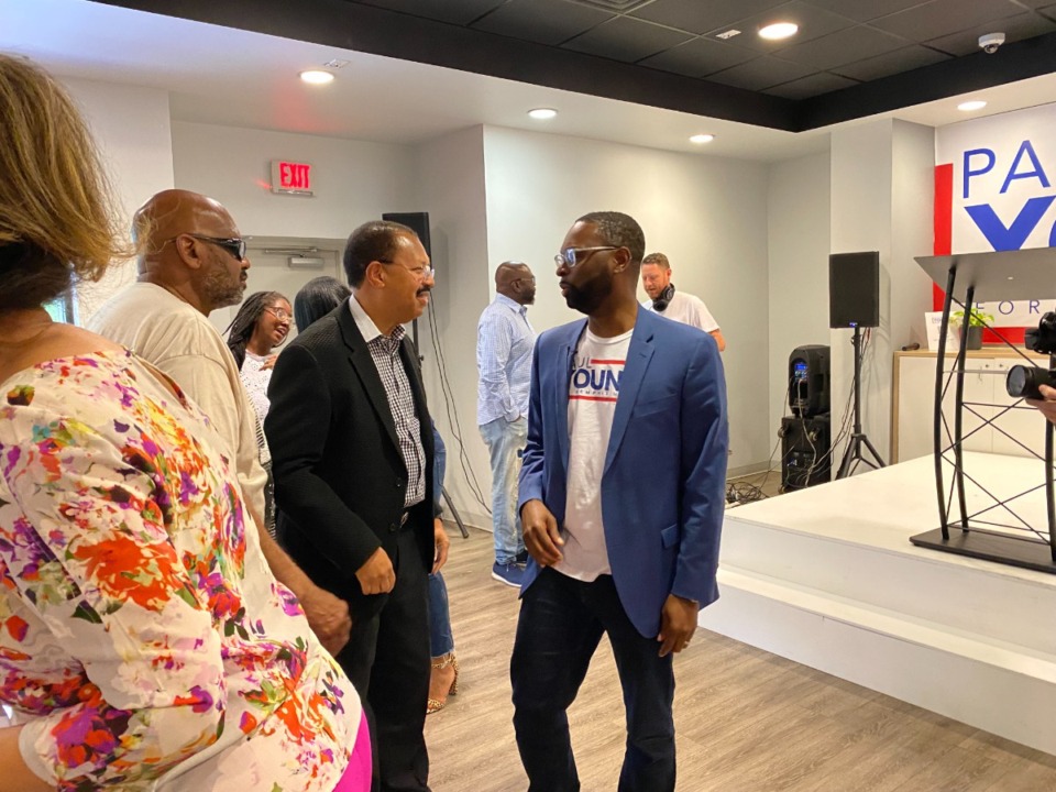 <strong>Mayoral contender Paul Young, right, with County Register Willie Brooks, left, during the Saturday, May 27, opening of Young&rsquo;s campaign headquarters in Poplar Plaza.</strong> (Bill Dries/The Daily Memphian)