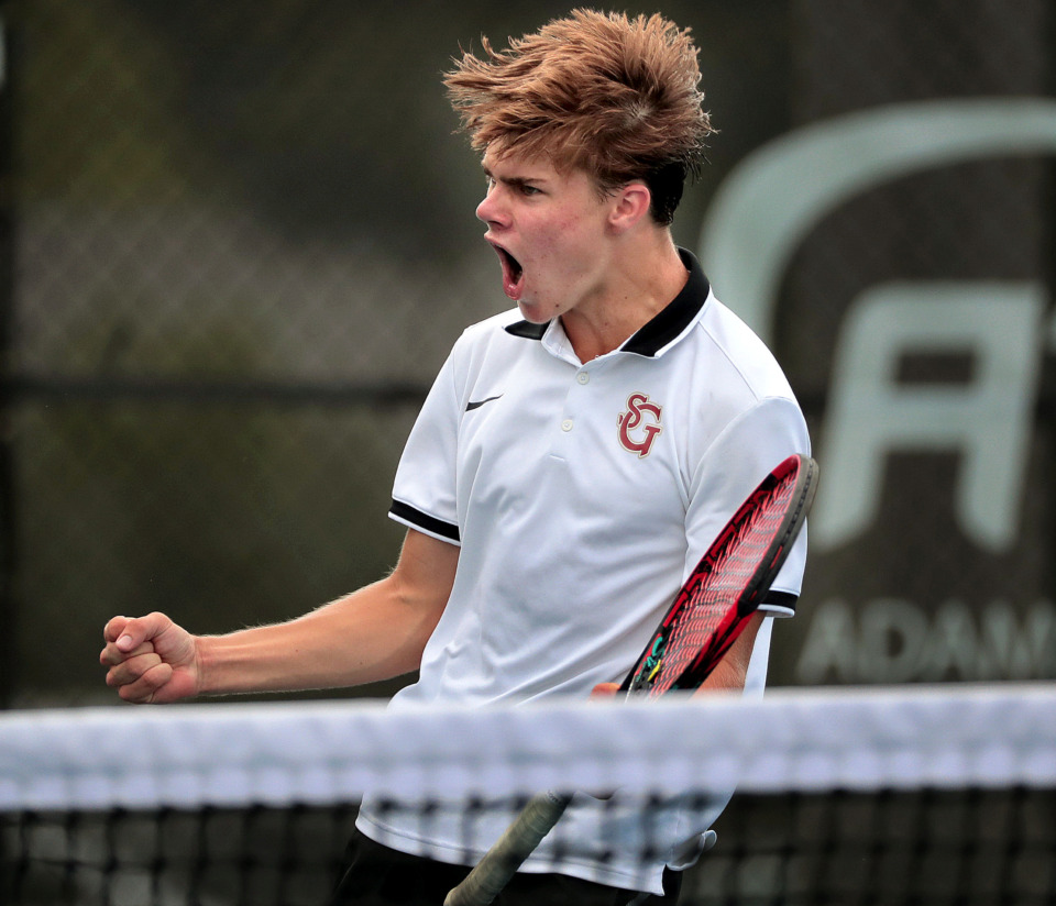 <strong>Walker Stearns from St. Georges celebrates winning the Div II Class A state championship during the finals of the Spring Fling singles and doubles tennis tournament at the Adams Tennis Complex in Murfreesboro on May 24, 2019.</strong> (Jim Weber/Daily Memphian)