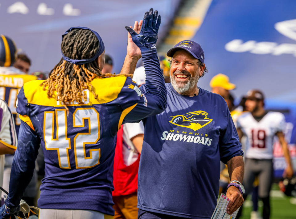 <strong>Head Coach Todd Haley celebrates with Antonio Reed (42) after the Showboats game against Houston, Sunday, May 28th at Simmons Bank Liberty Stadium. Memphis beat Houston 23-20.</strong> (Wes Hale/Special to The Daily Memphian)