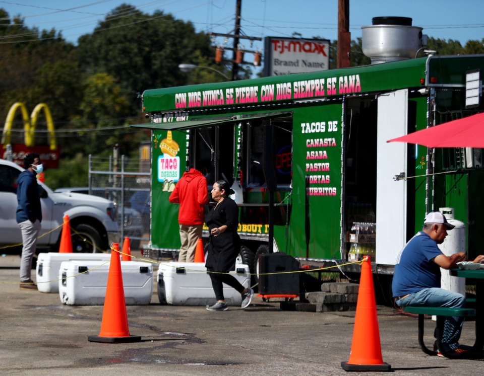 <strong>Customers line up for lunch outside TacoNGanas food truck on Summer Avenue Oct. 13, 2020.</strong> (Daily Memphian File)