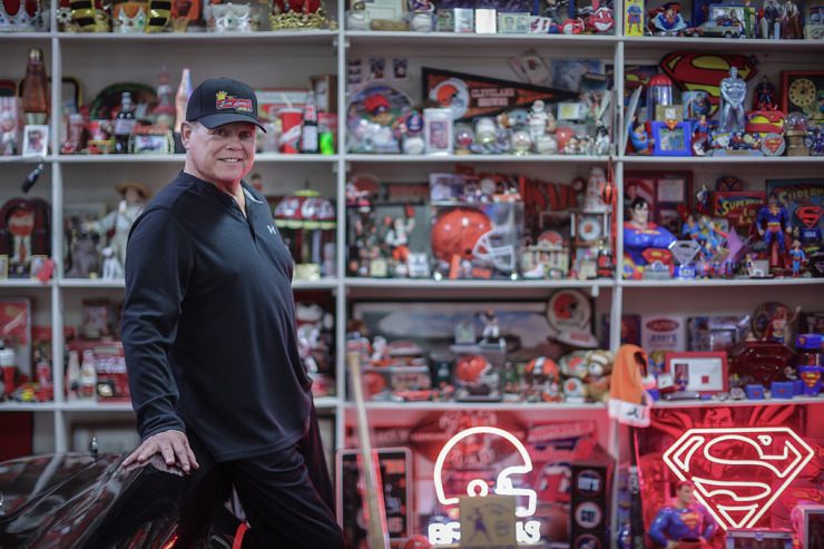 <strong>Jerry Lawler poses for a portrait in front of a wall of comics, Coke and Cleveland sports memorabilia at his East Memphis home June 1</strong>. (Patrick Lantrip/The Daily Memphian)