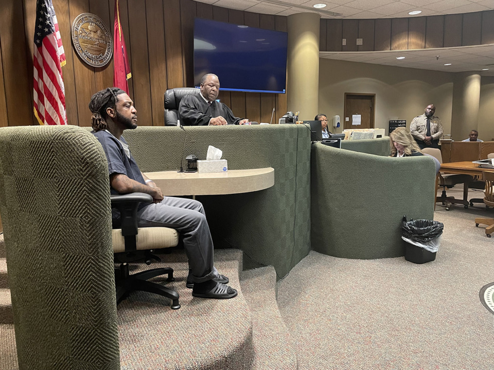 <strong>Jermarcus Johnson (far left), 26, pleaded guilty Friday, June 9, to three counts of accessory after the fact to the murder of Memphis rapper Young Dolph in Shelby County Criminal Court Division VII Judge Lee Coffee&rsquo;s courtroom (middle). He could be sentenced to two to four years for each count when he appears for a sentencing hearing on Aug. 10.</strong> (The Daily Memphian)