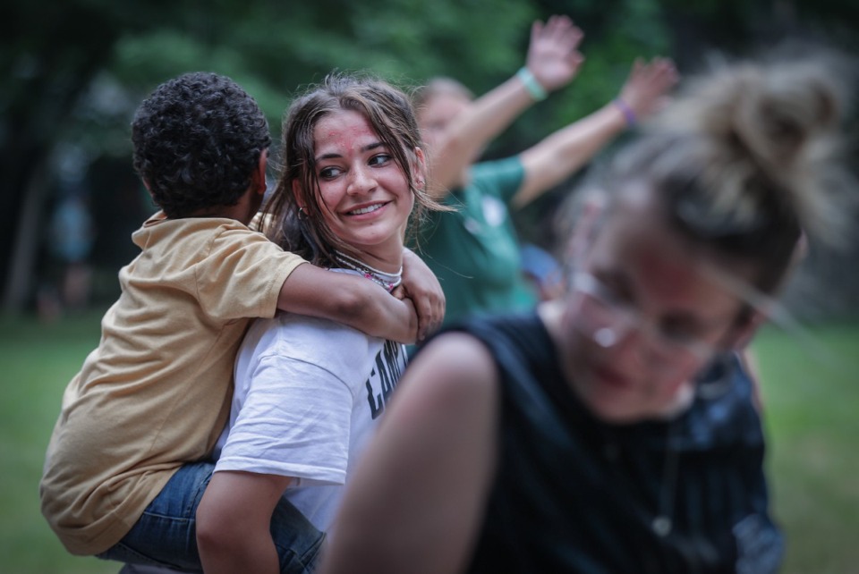 <strong>Volunteer Katherine Farell dances with a child as a part of Brinkley Heights Baptist Church's Street Reach ministry program June 8, 2023.</strong> (Patrick Lantrip/The Daily Memphian)